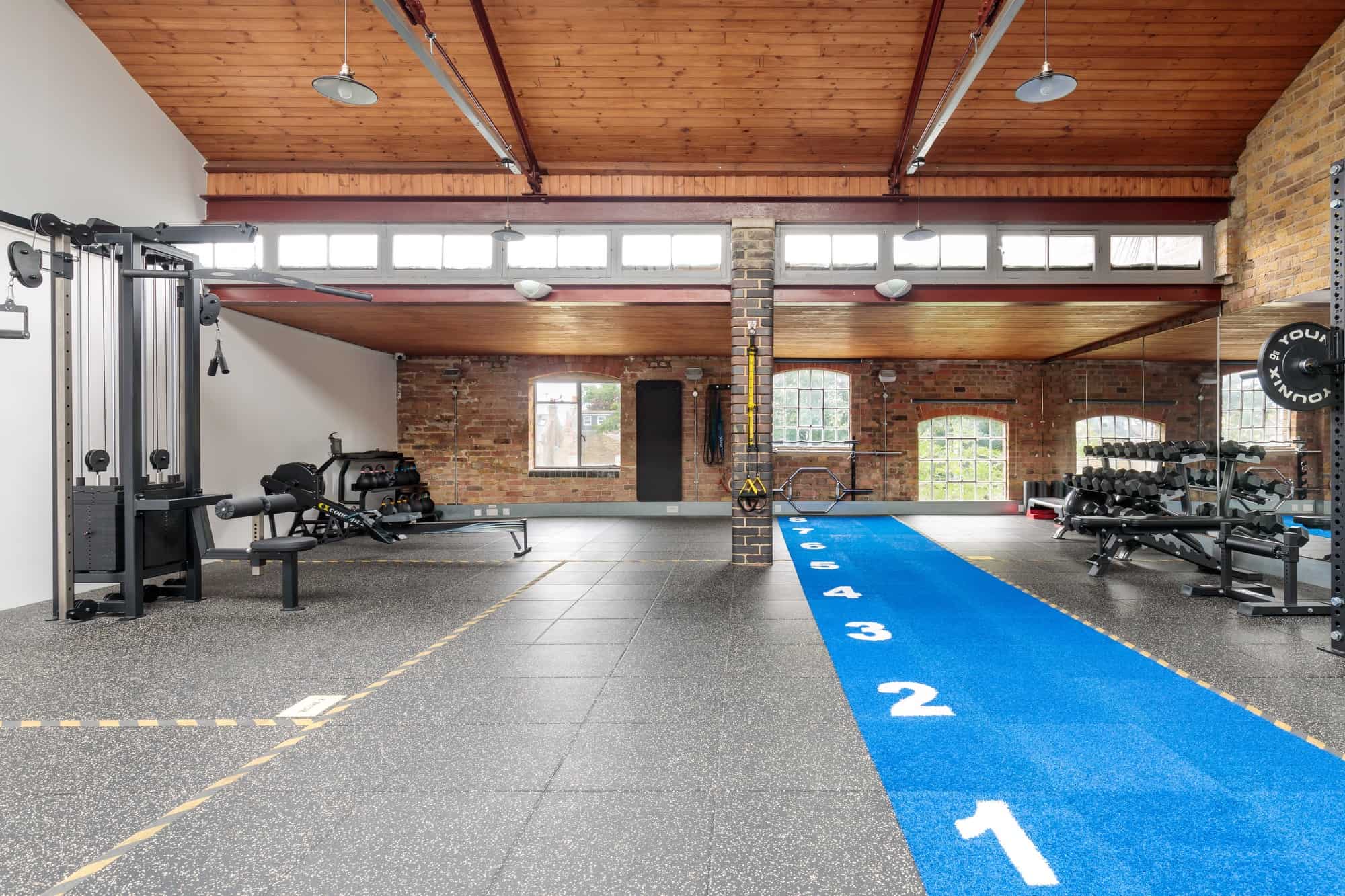 Kensal Gym NW10 - A first floor gym with warehouse feel and high level equipment. Available for exclusive hire for photoshoots and filming - The Location Guys