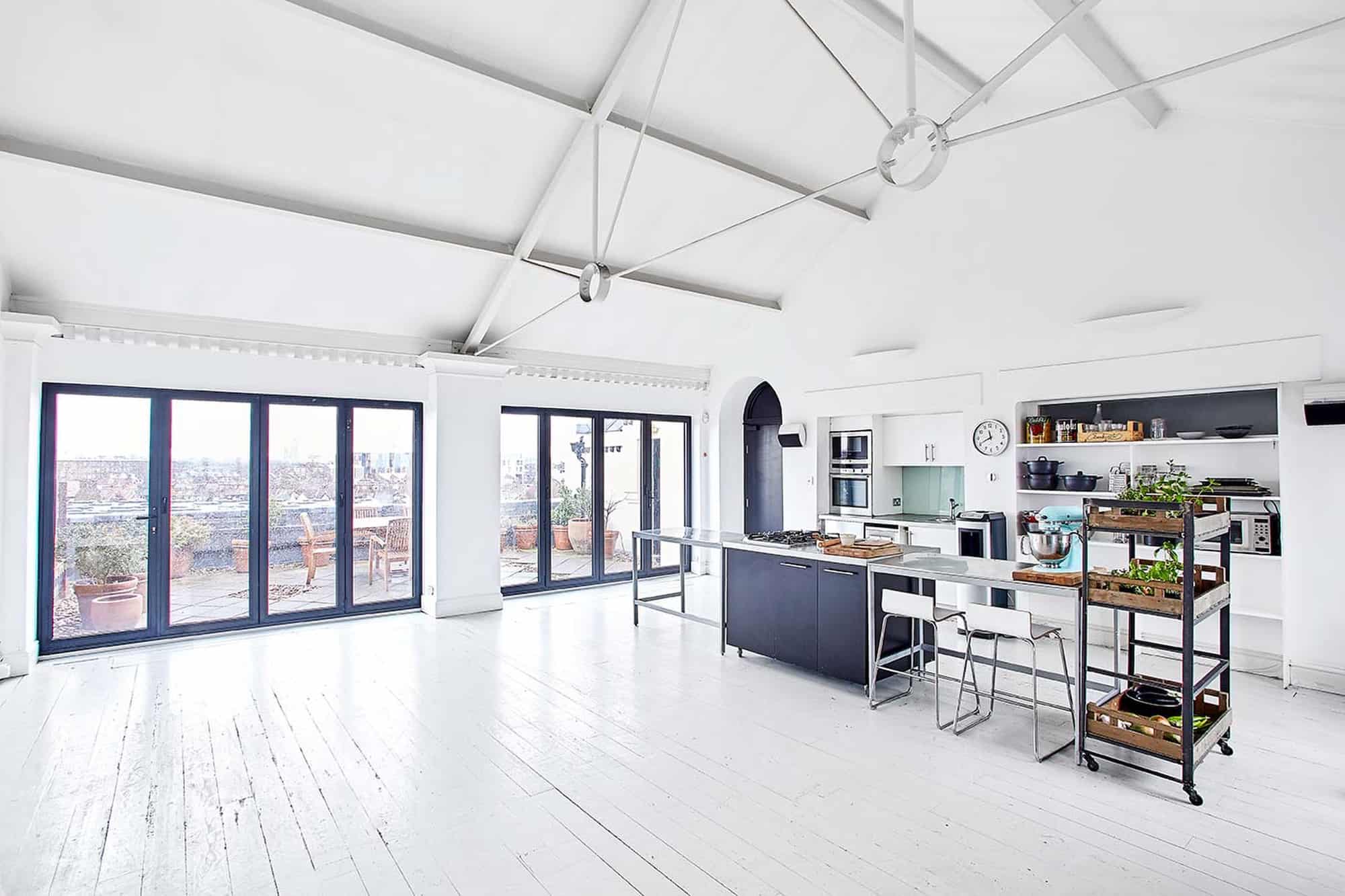 Warple Studio Two W3 - A white open plan studio space with roof terrace and city views - The Location Guys