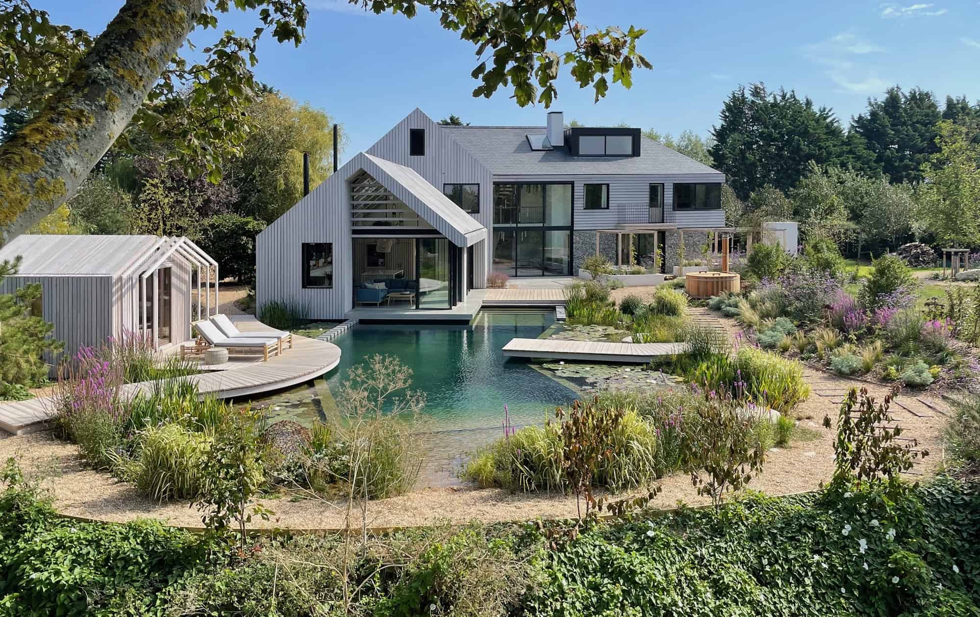Bosham PO18 - An incredible Grand Designs home on a site of 1.5 acres of beautifully landscaped gardens including a natural swimming pool - The Location Guys