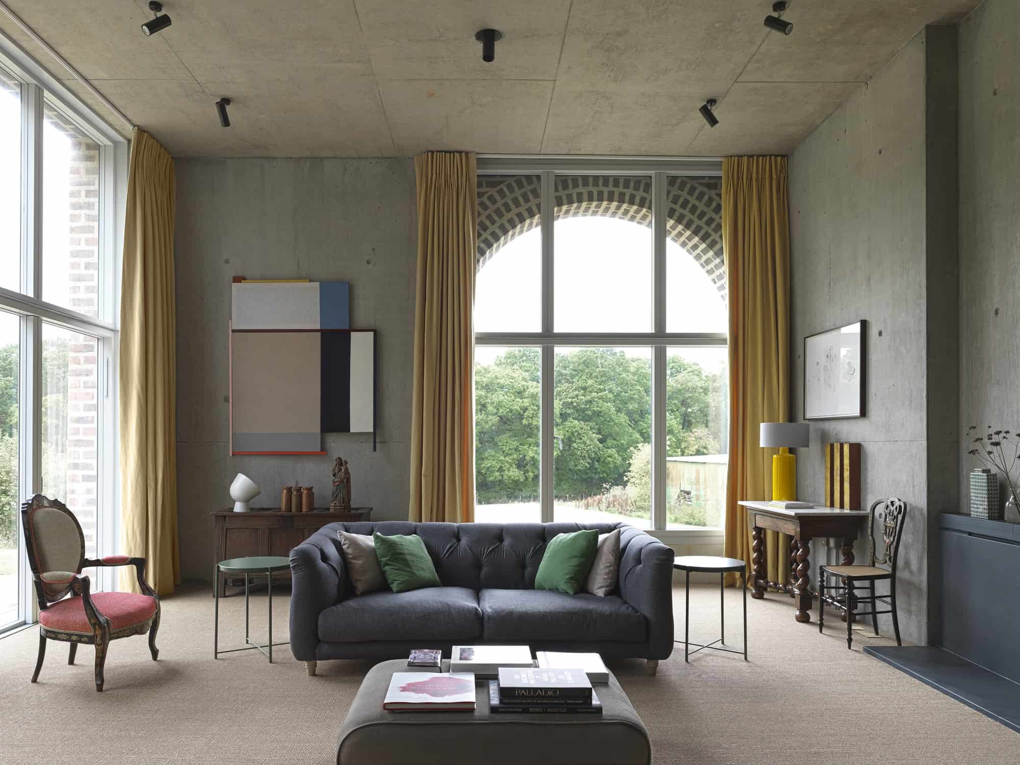 Upperton GU28 - An individual and imposing architect designed country home with incredible interiors of concrete and contemporary art - The Location Guys