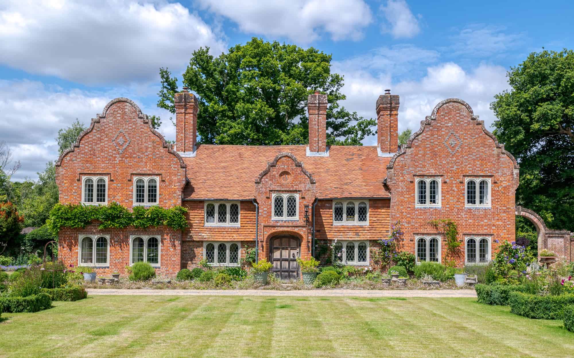 Jacobean Manor GU8 - A beautiful Jacobean Manor house with elegant interiors and gardens stretching to 15 acres, including outdoor pool - The Location Guys