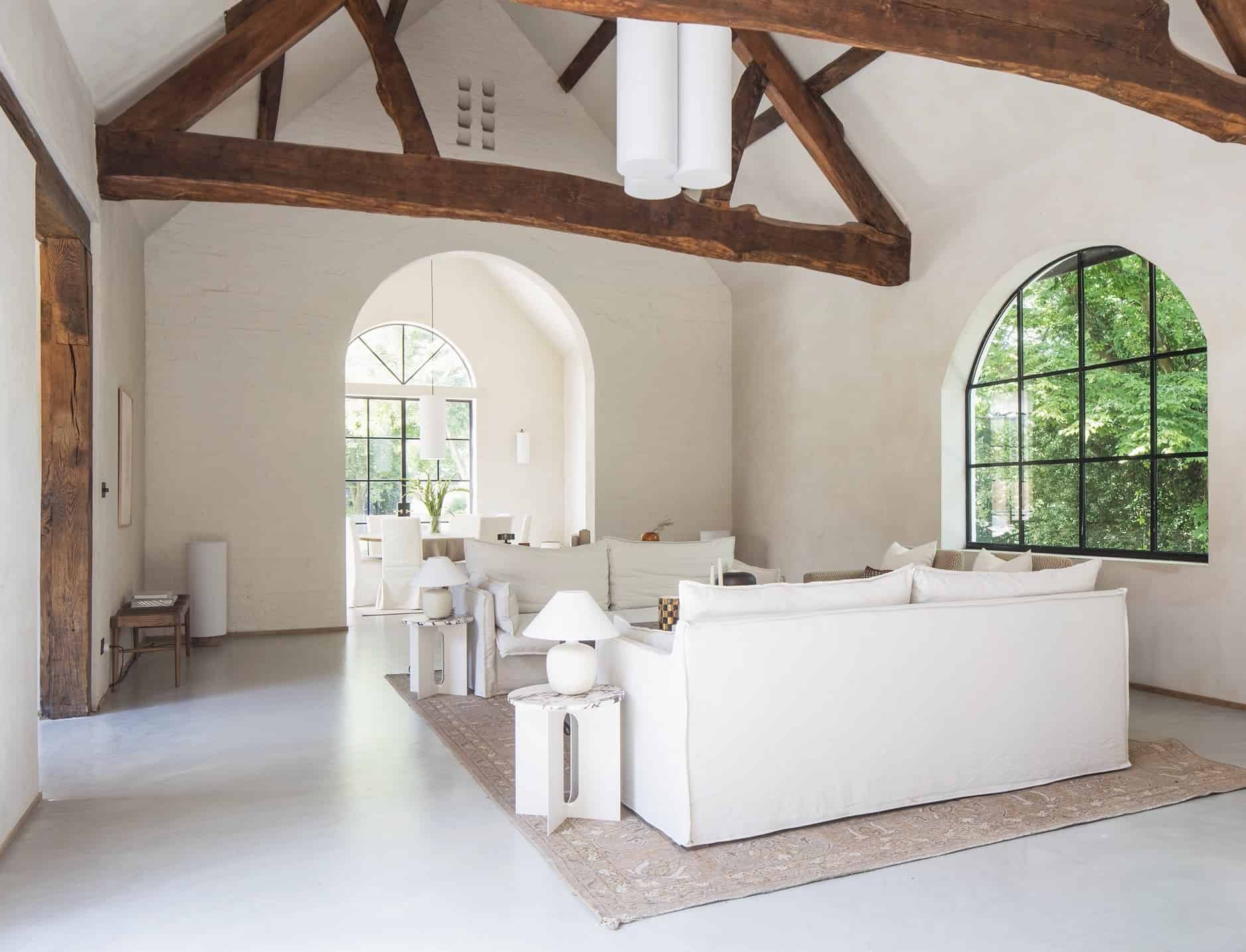 The Gatehouse BN45 - A former stable block converted into a stunning 6,500sq ft family home with spacious lofty interiors and a paired back interior style - The Location Guys