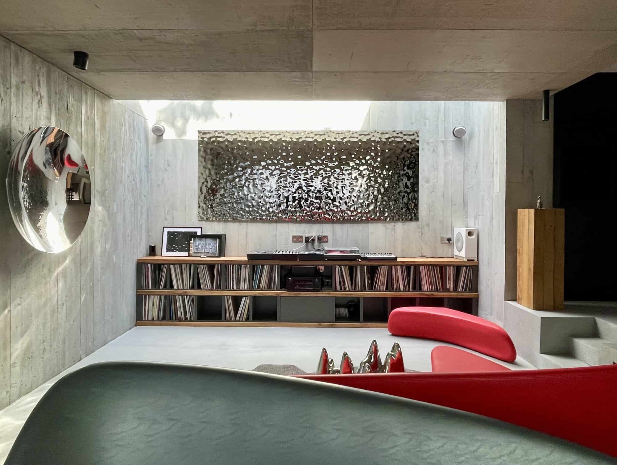 Bunker E12 - An incredible concrete-clad living space with contemporary and futuristic style furnishings and art - The Location Guys