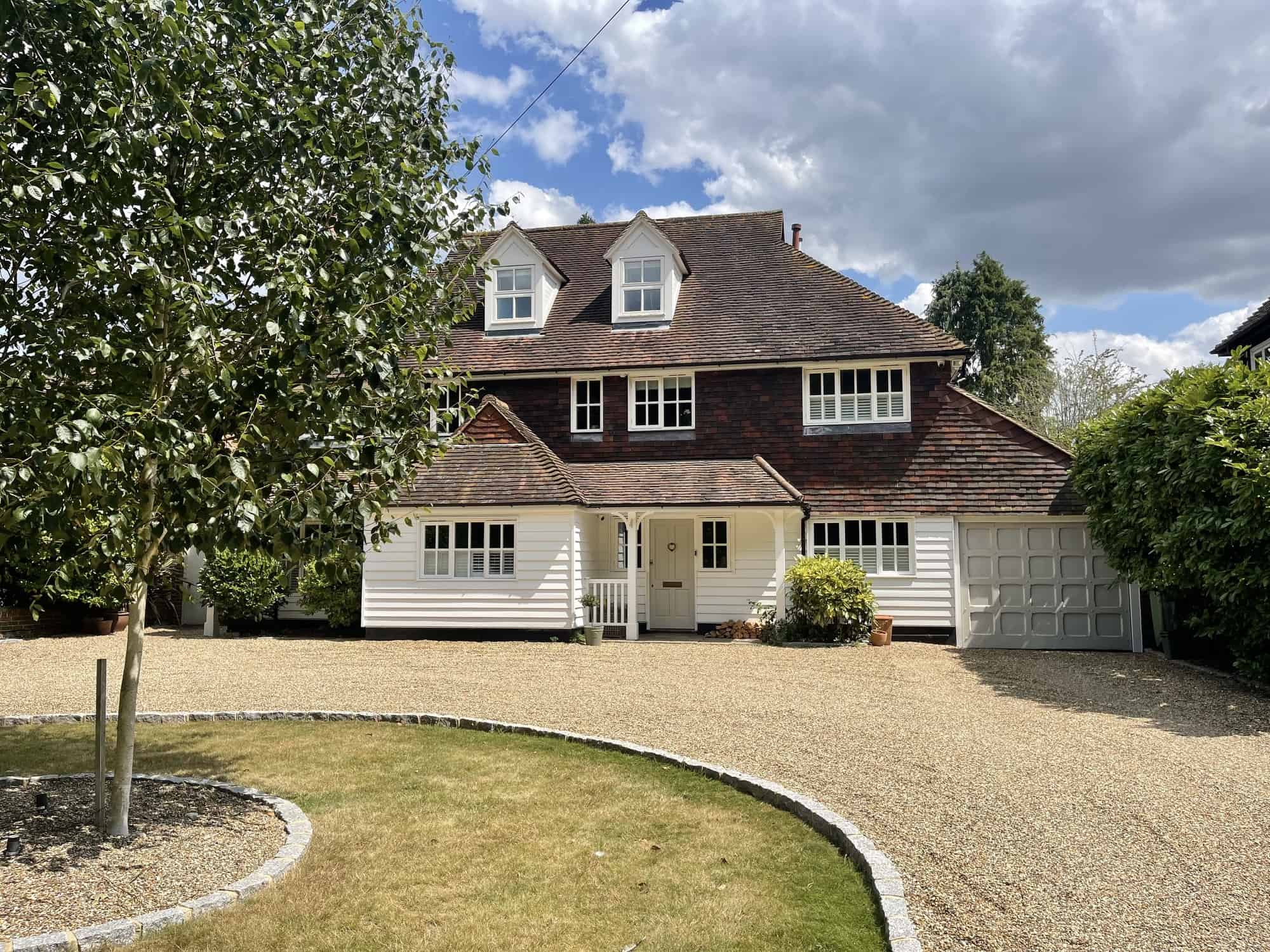 Coach House BR7 - A detached New England style home with large mature gardens and attractive weatherboard exterior - The Location Guys